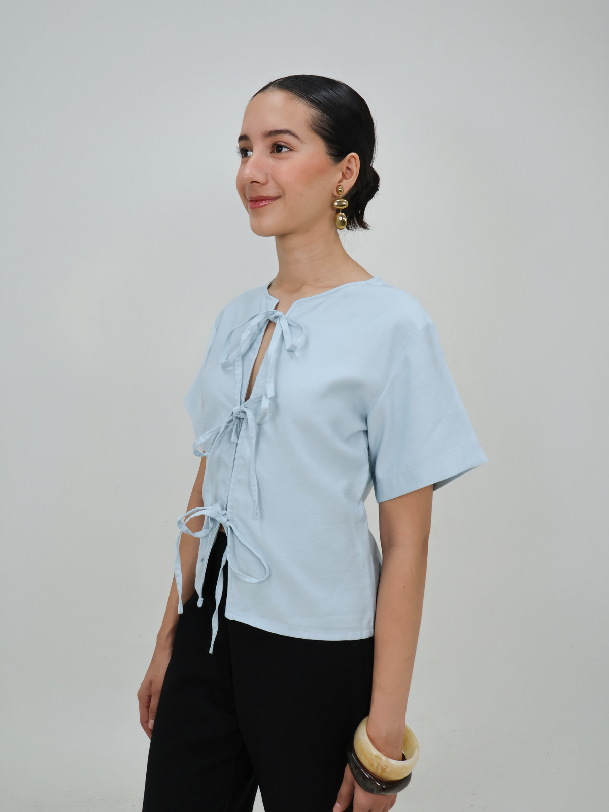 Blusa con moñitos - Punto Sole