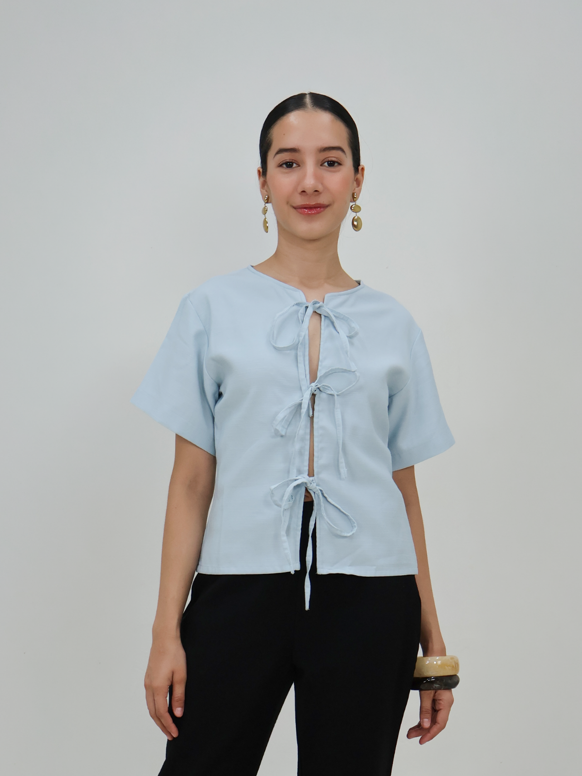 Blusa con moñitos - Punto Sole